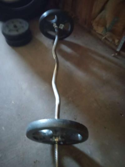 heavy punching bag and curl bar - Thumbnail 2