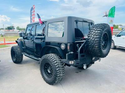 2013 Jeep Wrangler Unlimited 95k millas - Thumbnail 6