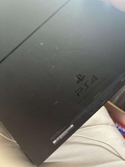 Black Playstation 4 - Jenison, Michigan