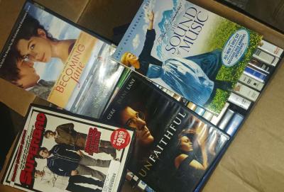 Box full of DVD movies - Thumbnail 4