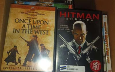 Box full of DVD movies - Thumbnail 3