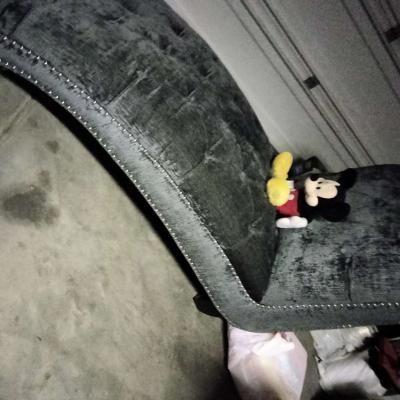 blue buttoned curvy tuffed sofa - Thumbnail 2