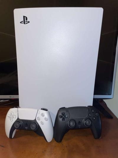 Playstation 5 with 2 controllers - College Station, Texas