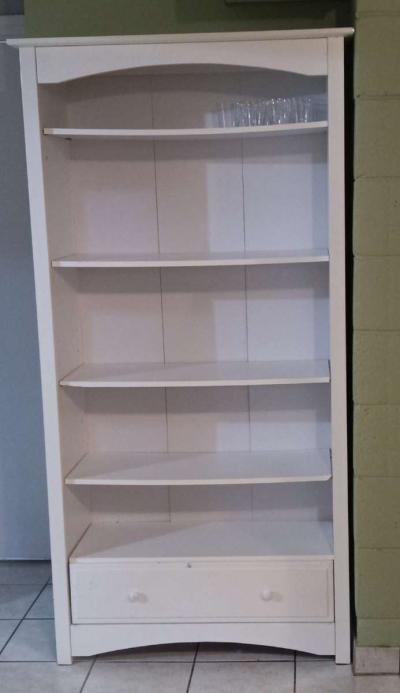 Two white bookshelves