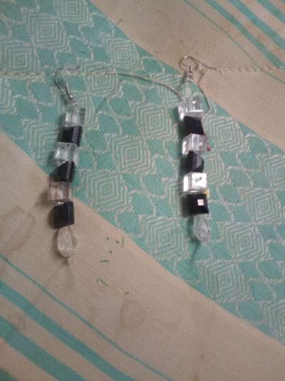 a religious wall hanging and two pairs of hand made earrings - Thumbnail 3