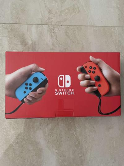 Nintendo switch with Neon blue and Neon red Joycon - Thumbnail 2