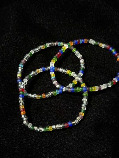 Set of 3 elastic rainbow and clear beaded bracelets - Tehachapi, California