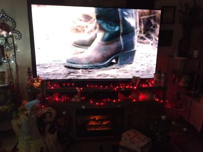 75 inch Philips 4 K smart TV and 80 inch fireplace - Thumbnail 2