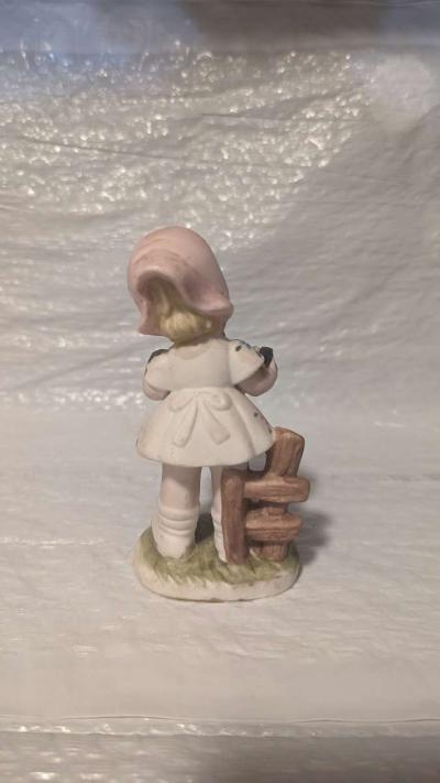 A Little Girl Playing an Accordion with a White Dress - Thumbnail 3