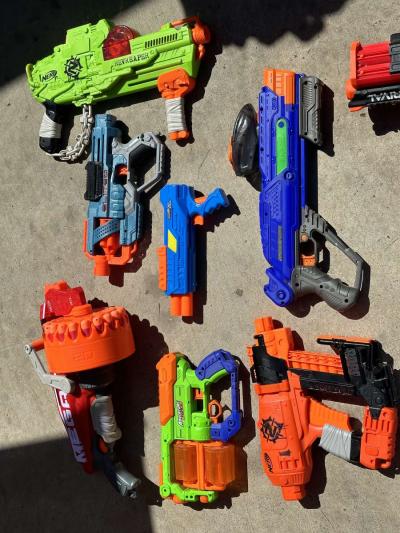 Bunch of Nerf Guns Ammo Gear and a Nerf Shelf - Thumbnail 2