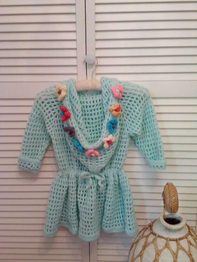 crocheted hoodie with puff flowers and heart wood buttons