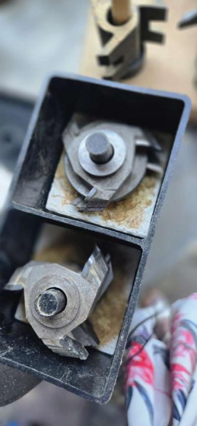 wood shaper with a bunch of bits