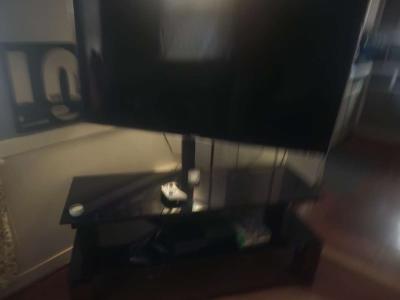 Samsung 50in with Samsung surround sound speaker and PS4
