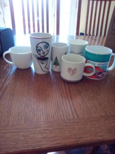 black tablet and Starbucks coffee mugs - Thumbnail 2