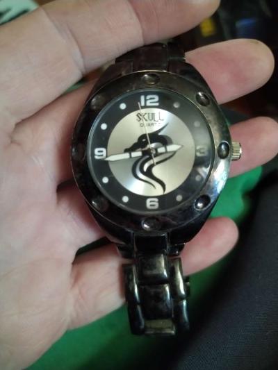 skull quartz analog watch dragon on face