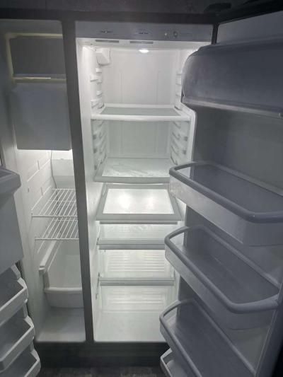 GE refrigerator side by side with water and ice maker dispen - Thumbnail 4