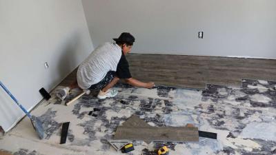 installation of pvc flooring tiles sidingh - Thumbnail 5