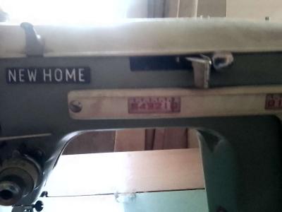janome sewing machine in cabinet