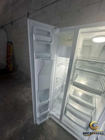 GE refrigerator side by side with ice and water dispenser - Thumbnail 3