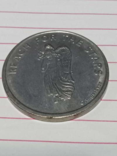 metal coin with  woman on it - Brentwood, California