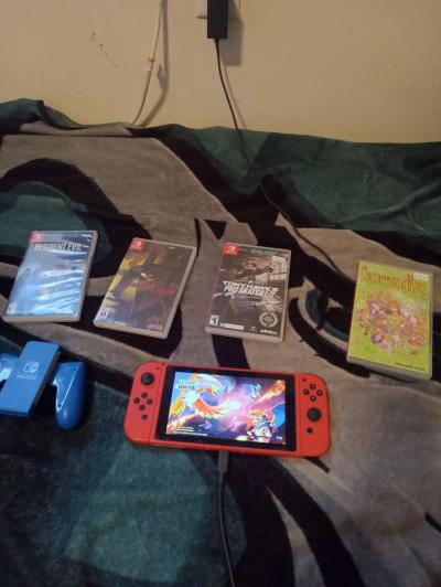 Nintendo switch with original box it came in 3 games