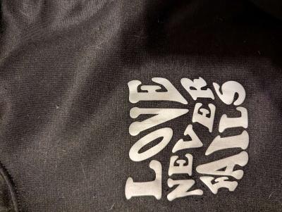 Love Never Fails Hoodie - Thumbnail 3