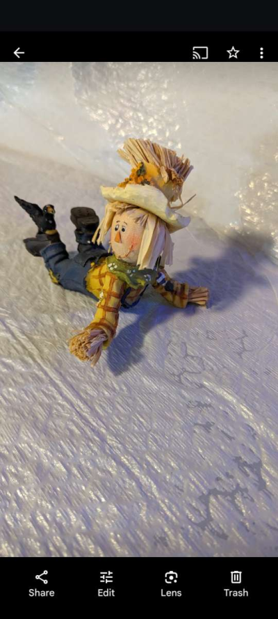 Resin Playful Scarecrow Laying On His Stomach With A Black C - Thumbnail 4