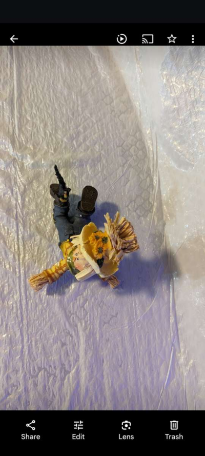 Resin Playful Scarecrow Laying On His Stomach With A Black C - Thumbnail 3