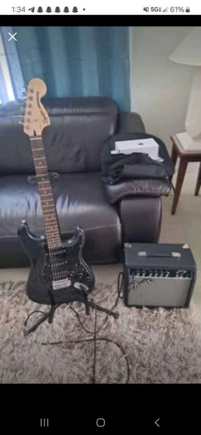 Black Electric guitar fender squier stratocaster