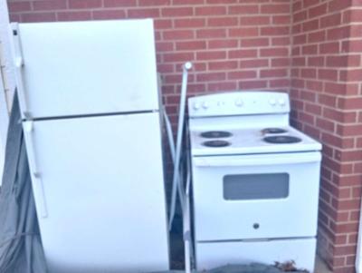 refrigerator and gently used electric stove