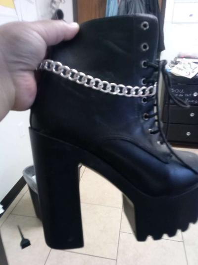 a pair of black platform boots high heeled - Thumbnail 3