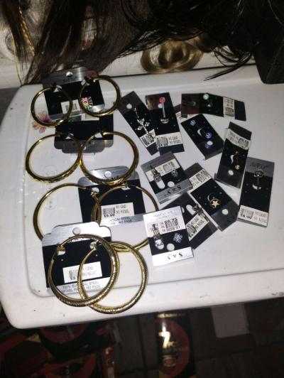 earrings tongue rings and belly button piercings