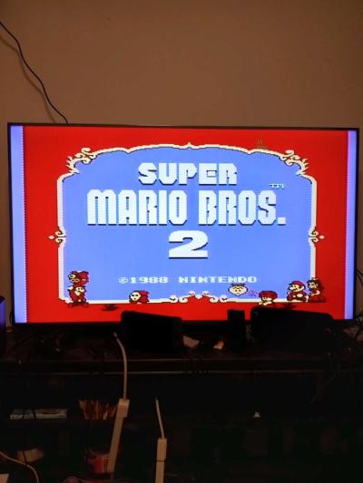 2 Nintendo NES consoles with 3 controllers and 5 games - Thumbnail 3