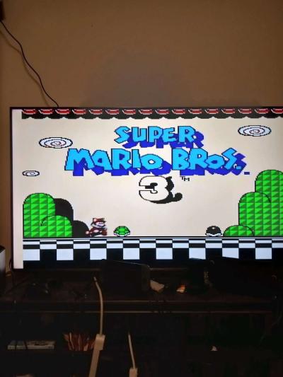 2 Nintendo NES consoles with 3 controllers and 5 games - Thumbnail 4