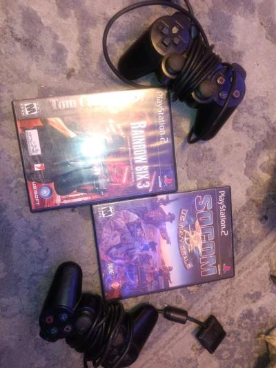 PlayStation 2 controllers and 2 PS2 games