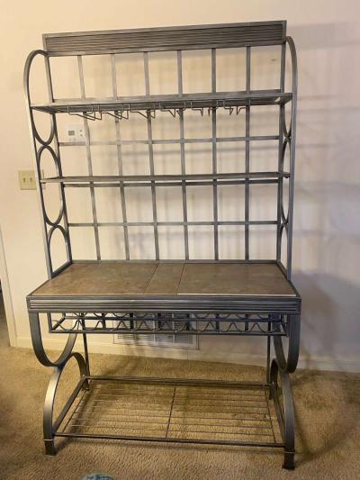gray metal bakers and wine rack