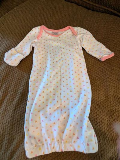 Infant gown with pink and yellow accents