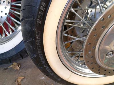 front and rear white wall tires and chrome spoke rims - Thumbnail 5