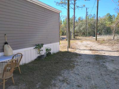 land and a single wide mobile home - Thumbnail 5