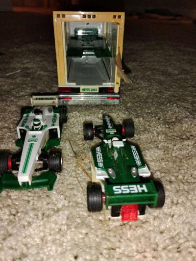 2003 Hess Toy Truck and Racecars This collectible toy inclu