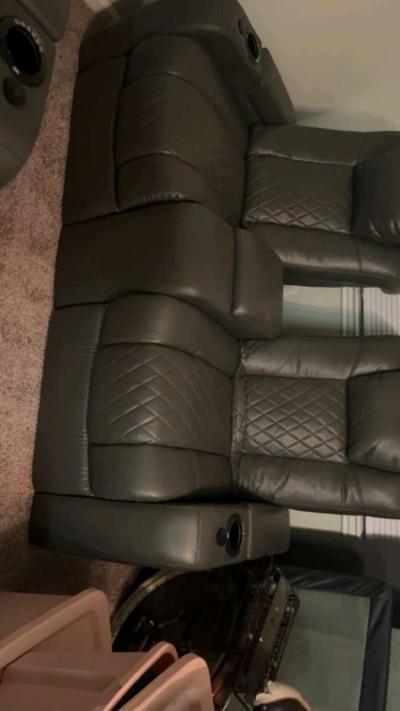 Matching Set Dark Leather Reclining Sofa and Recliner - Houston, Texas