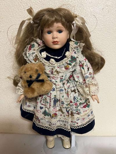 vintage porcelain doll hoding stuffed bear - Thumbnail 3
