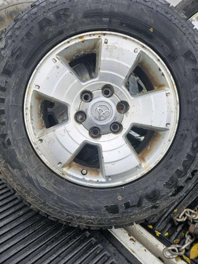 Five toyota tacoma wheels and tires - Thumbnail 1