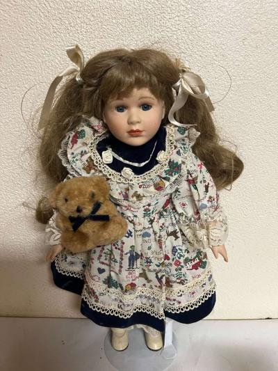 vintage porcelain doll hoding stuffed bear - Thumbnail 4
