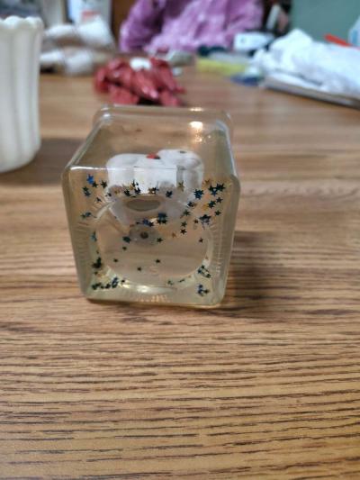 clear jelly candle with small white animals in the candle - Thumbnail 2