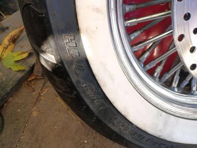 front and rear white wall tires and chrome spoke rims - Thumbnail 4
