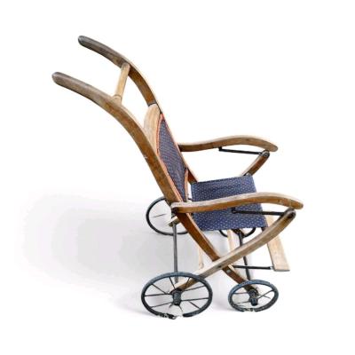 Antique baby wheelchair