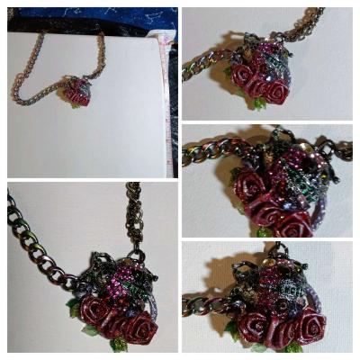 a bejeweled ladybug and roses on a black metal chain - Thumbnail 1