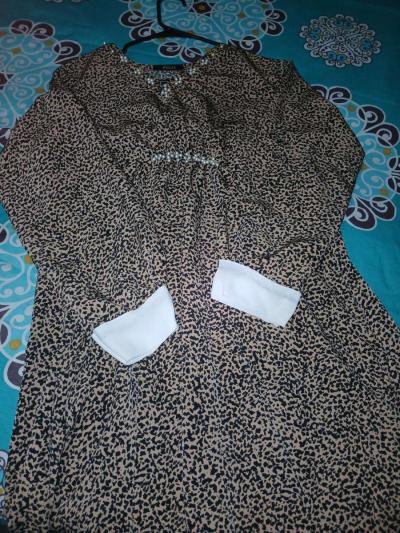 a shirt with leopard print with stones on weast - Thumbnail 2