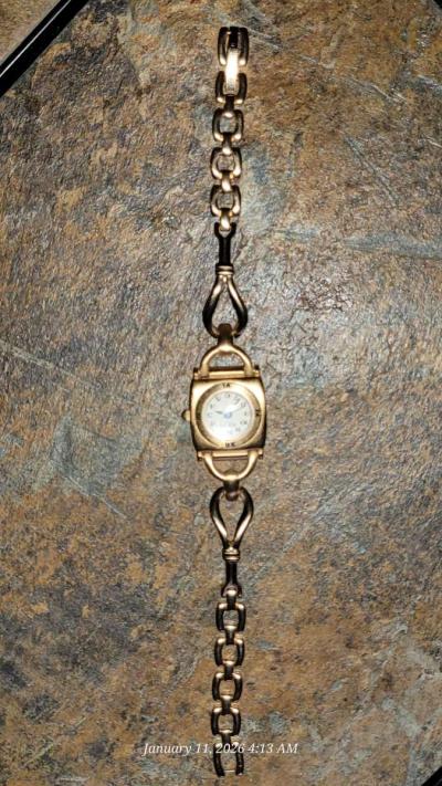 Vintage Fossil gold tone watch with case